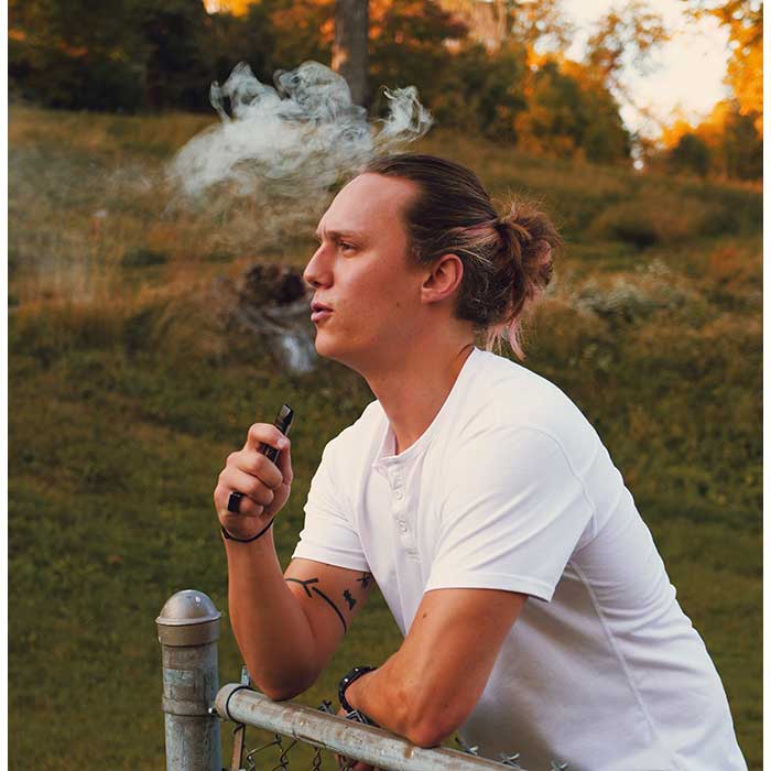 CCell Luster lifestyle photo person holding device CCell Luster lifestyle photo person holding device