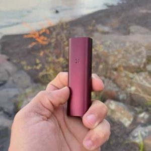 Pax 3 vaporizer lifestyle photo in hand for short video