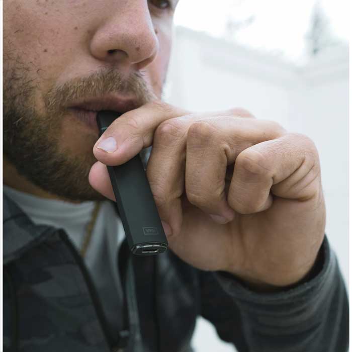 VPM Brand P30 pod system vape pen lifestyle photo in use VPM Brand P30 pod system vape pen lifestyle photo in use