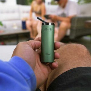 XMax Starry4 cart battery lifestyle photo in hand