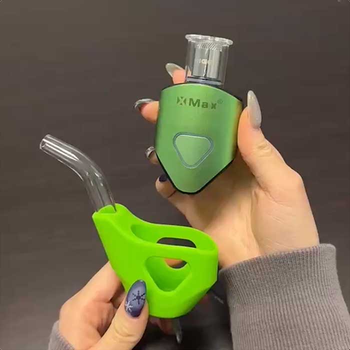 XMax Riggo Dual Using Portable Vaporizer Green