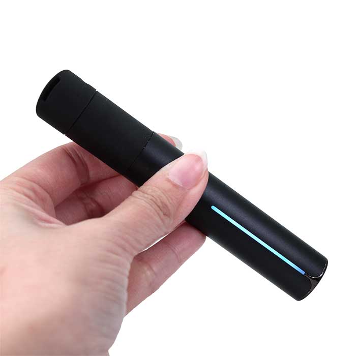 Puffco Pivot Onyx Electric Dab Pen in hand